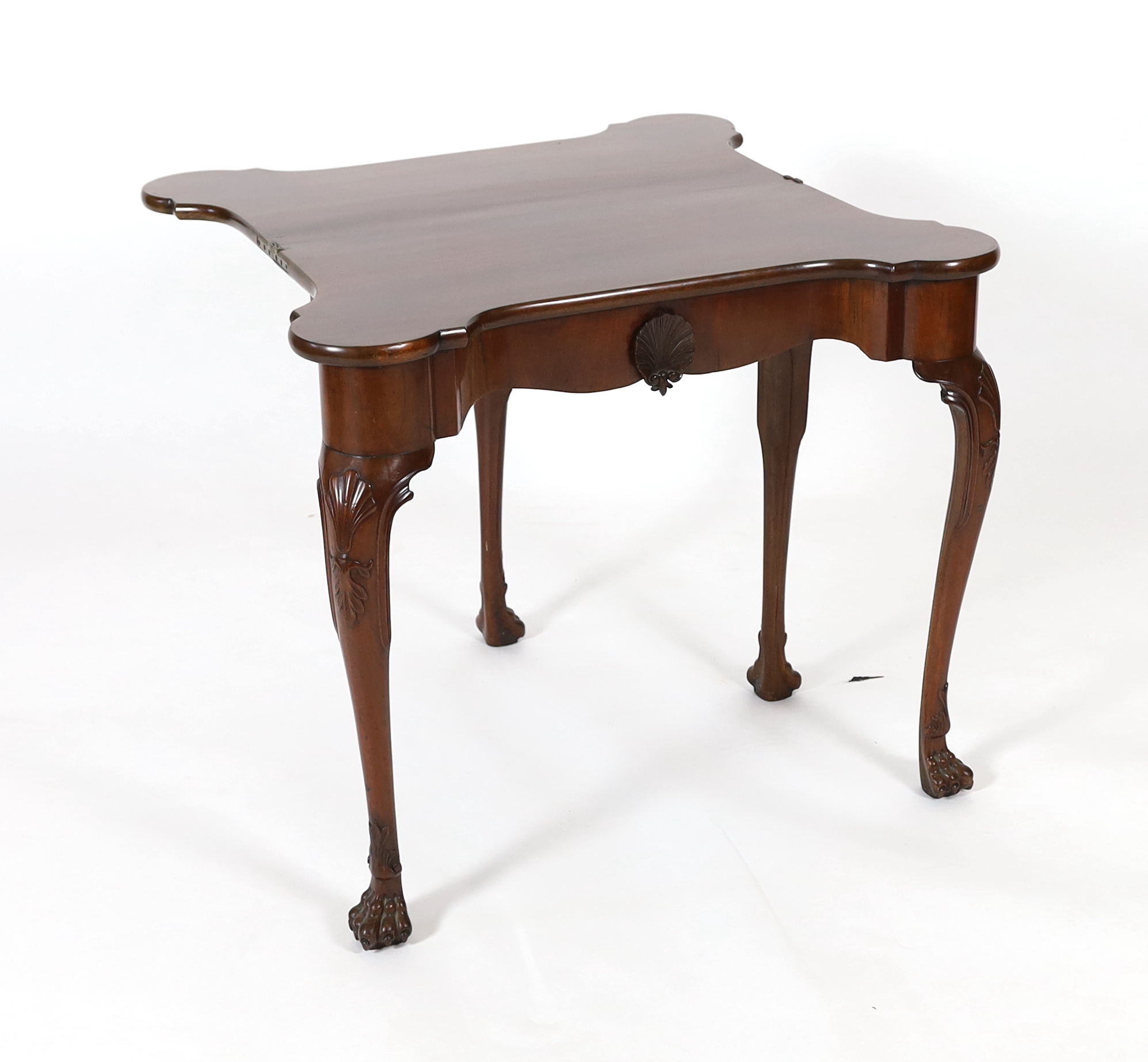 A George II mahogany serpentine folding top tea table, 80cm wide, 40cm deep, 75cm high